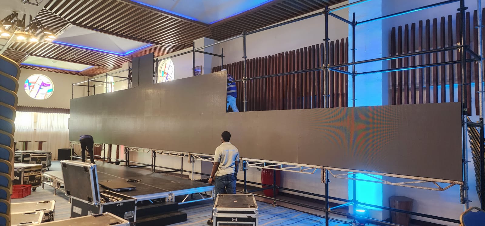 Large format LED screen build on scaffolding with flight cases and staging in a Nairobi venue